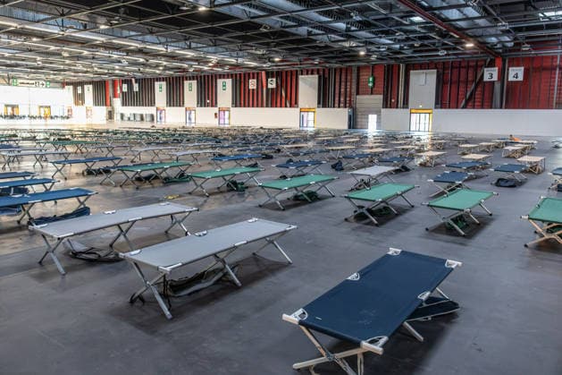 More Than 400 Emergency Camp Beds For Wildfire Evacuees - Bordeaux More than 400 emergency camp beds are set up inside Bordeaux Exhibition Centre (Parc des Expositions) to accommodate people evacuated from their homes following the major wildfires affecting the Gironde department, Bordeaux, France, on July 23, 2026. Photo by Margot Le Gonidec ABACAPRESS.COM Bordeaux France  Copyright: xLexGonidecxMargot ABACAx