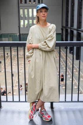 July 24, 2026, London, London, UK: Artist Lina LapelytÄ poses with her created maze-like installation, transforming the Turbine Hall into a collaborative stage. Audiences are invited to co-create in a piece of mass choreography, moving through a grid of wooden barriers. You are also free to quietly watch the performance unfold, from the Turbine Hall bridge. London, UK. London UK  - ZUMAl94_ 20260724_zaf_l94_004 Copyright: xRayxTangx