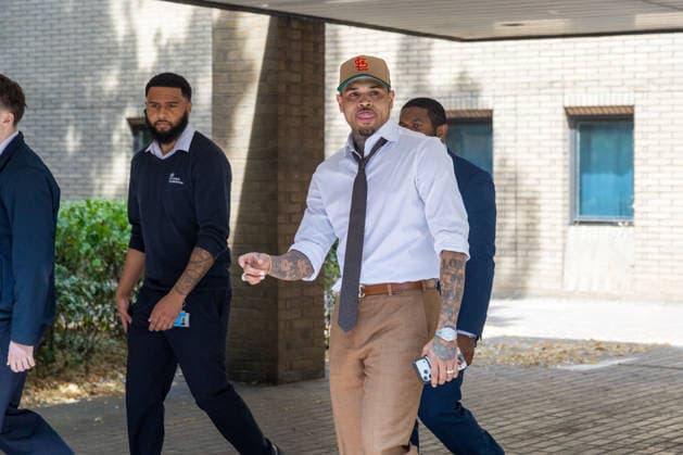 July 24, 2026, London, England, United Kingdom: R&B singer CHRIS BROWN leaves Southwark Crown Court after a case management hearing. He is charged over an alleged assault in a London nightclub. The American musician is accused of causing grievous bodily harm to Abraham Diaw in February 2023. London United Kingdom - ZUMAs262 20260724_zip_s262_004 Copyright: xTayfunxSalcix
