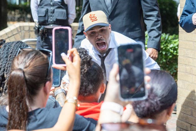July 24, 2026, London, England, United Kingdom: R&B singer CHRIS BROWN leaves Southwark Crown Court after a case management hearing. He is charged over an alleged assault in a London nightclub. The American musician is accused of causing grievous bodily harm to Abraham Diaw in February 2023. London United Kingdom - ZUMAs262 20260724_zip_s262_005 Copyright: xTayfunxSalcix