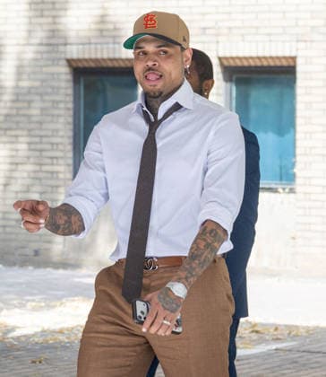 July 24, 2026, London, England, United Kingdom: R&B singer CHRIS BROWN leaves Southwark Crown Court after a case management hearing. He is charged over an alleged assault in a London nightclub. The American musician is accused of causing grievous bodily harm to Abraham Diaw in February 2023. London United Kingdom  - ZUMAs262 20260724_zip_s262_001 Copyright: xTayfunxSalcix