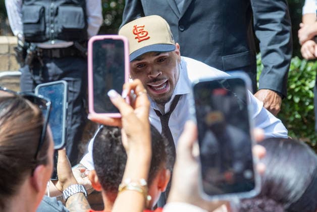 July 24, 2026, London, England, United Kingdom: R&B singer CHRIS BROWN leaves Southwark Crown Court after a case management hearing. He is charged over an alleged assault in a London nightclub. The American musician is accused of causing grievous bodily harm to Abraham Diaw in February 2023. London United Kingdom - ZUMAs262 20260724_zip_s262_009 Copyright: xTayfunxSalcix