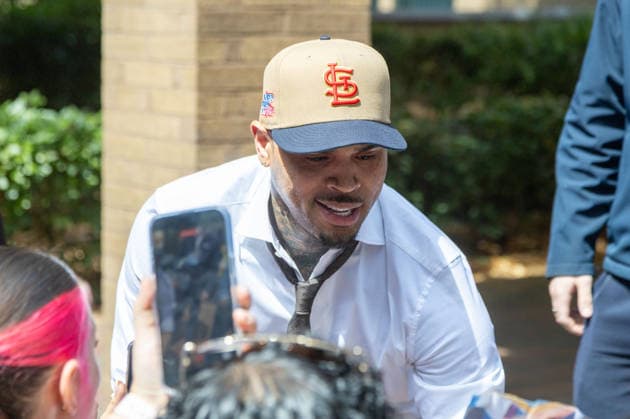 July 24, 2026, London, England, United Kingdom: R&B singer CHRIS BROWN leaves Southwark Crown Court after a case management hearing. He is charged over an alleged assault in a London nightclub. The American musician is accused of causing grievous bodily harm to Abraham Diaw in February 2023. London United Kingdom - ZUMAs262 20260724_zip_s262_011 Copyright: xTayfunxSalcix