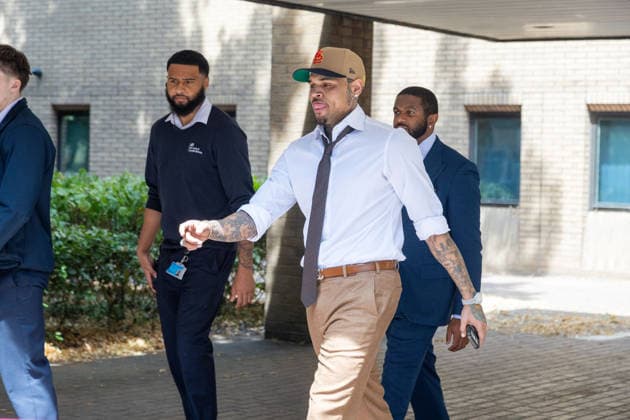 July 24, 2026, London, England, United Kingdom: R&B singer CHRIS BROWN leaves Southwark Crown Court after a case management hearing. He is charged over an alleged assault in a London nightclub. The American musician is accused of causing grievous bodily harm to Abraham Diaw in February 2023. London United Kingdom  - ZUMAs262 20260724_zip_s262_007 Copyright: xTayfunxSalcix