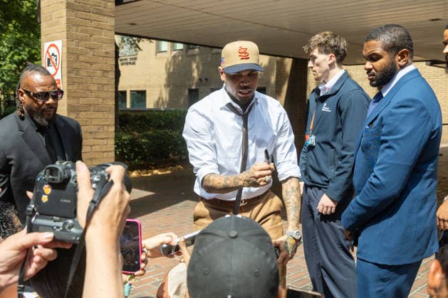 July 24, 2026, London, England, United Kingdom: R&B singer CHRIS BROWN leaves Southwark Crown Court after a case management hearing. He is charged over an alleged assault in a London nightclub. The American musician is accused of causing grievous bodily harm to Abraham Diaw in February 2023. London United Kingdom - ZUMAs262 20260724_zip_s262_015 Copyright: xTayfunxSalcix