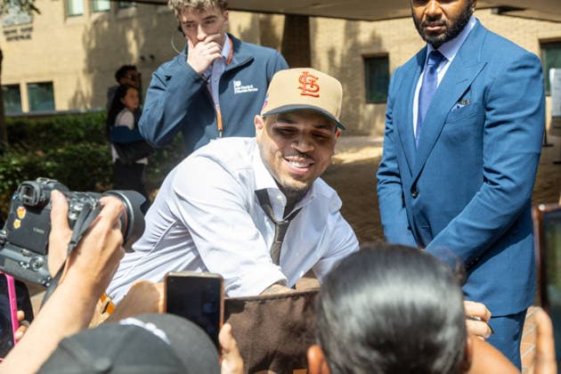 July 24, 2026, London, England, United Kingdom: R&B singer CHRIS BROWN leaves Southwark Crown Court after a case management hearing. He is charged over an alleged assault in a London nightclub. The American musician is accused of causing grievous bodily harm to Abraham Diaw in February 2023. London United Kingdom  - ZUMAs262 20260724_zip_s262_013 Copyright: xTayfunxSalcix