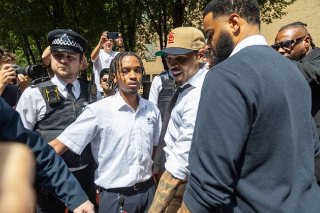 July 24, 2026, London, England, United Kingdom: R&B singer CHRIS BROWN leaves Southwark Crown Court after a case management hearing. He is charged over an alleged assault in a London nightclub. The American musician is accused of causing grievous bodily harm to Abraham Diaw in February 2023. London United Kingdom  - ZUMAs262 20260724_zip_s262_014 Copyright: xTayfunxSalcix