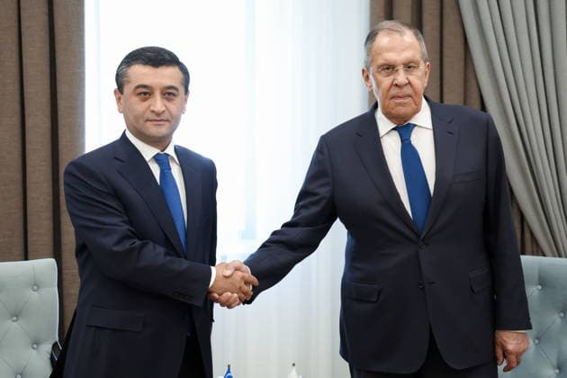 KYRGYZSTAN, ISSYK-KUL REGION - JULY 24, 2026: Bakhtiyor Saidov (L), Foreign Minister of Uzbekistan, and his counterpart Sergei Lavrov of Russia shake hands during a bilateral meeting on the sidelines of a regular meeting of the SCO (Shanghai Cooperation Organisation) Council of Foreign Ministers in Cholpon-Ata, a resort town on the northern shore of Lake Issyk-Kul. Russian Foreign Ministry TASS  95399235