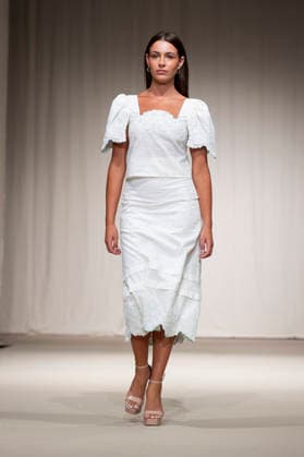 MALAGA MODA - MOMAD Fashion Week de Madrid, Spain - 24 Jul 2026 A model walks the runway wearing a design by MALAGA MODA during Momad Fashion Week de Madrid in IFEMA. Madrid Spain Copyright: xAtilanoxGarciax xSOPAxImagesx photo03026