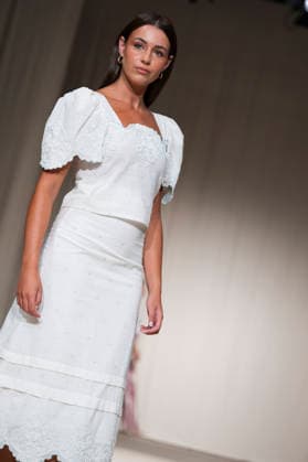 MALAGA MODA - MOMAD Fashion Week de Madrid, Spain - 24 Jul 2026 A model walks the runway wearing a design by MALAGA MODA during Momad Fashion Week de Madrid in IFEMA. Madrid Spain Copyright: xAtilanoxGarciax xSOPAxImagesx photo03027