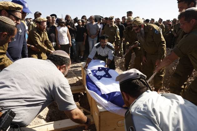 Thousands Attend Funeral of Benayahu Melet, Killed Defending Hikers Near Havat Gilad HAVAT GILAD, WEST BANK JULY 24, 2026: Thousands gathered to pay their final respects and lay to rest Benayahu Melet, a member of the Havat Gilad civilian alert squad and the community s agriculture director. Melet, 32, was killed earlier that day after rushing to assist a group of Israeli hikers who had been attacked near the community. During the incident, a Palestinian assailant seized his weapon and shot him dead. He is survived by his wife, Esther, and their two daughters, Tair Eretz and Adama Ivriya. Following his death, Melet was recognized as a fallen IDF soldier and given a military burial. A second Israeli, IDF Major Yuval Ezra, 27, was also ki Copyright: x xHilelxbenxorx xJNAxPressx