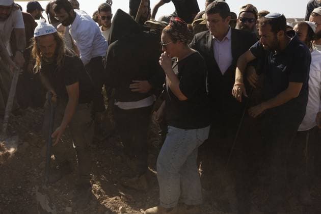 Thousands Attend Funeral of Benayahu Melet, Killed Defending Hikers Near Havat Gilad HAVAT GILAD, WEST BANK JULY 24, 2026: Thousands gathered to pay their final respects and lay to rest Benayahu Melet, a member of the Havat Gilad civilian alert squad and the community s agriculture director. Melet, 32, was killed earlier that day after rushing to assist a group of Israeli hikers who had been attacked near the community. During the incident, a Palestinian assailant seized his weapon and shot him dead. He is survived by his wife, Esther, and their two daughters, Tair Eretz and Adama Ivriya. Following his death, Melet was recognized as a fallen IDF soldier and given a military burial. A second Israeli, IDF Major Yuval Ezra, 27, was also ki Copyright: x xHilelxbenxorx xJNAxPressx