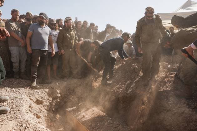 Thousands Attend Funeral of Benayahu Melet, Killed Defending Hikers Near Havat Gilad HAVAT GILAD, WEST BANK JULY 24, 2026: Thousands gathered to pay their final respects and lay to rest Benayahu Melet, a member of the Havat Gilad civilian alert squad and the community s agriculture director. Melet, 32, was killed earlier that day after rushing to assist a group of Israeli hikers who had been attacked near the community. During the incident, a Palestinian assailant seized his weapon and shot him dead. He is survived by his wife, Esther, and their two daughters, Tair Eretz and Adama Ivriya. Following his death, Melet was recognized as a fallen IDF soldier and given a military burial. A second Israeli, IDF Major Yuval Ezra, 27, was also ki Copyright: x xHilelxbenxorx xJNAxPressx