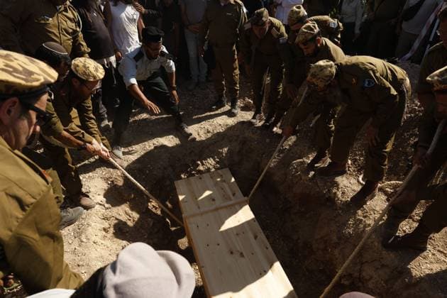 Thousands Attend Funeral of Benayahu Melet, Killed Defending Hikers Near Havat Gilad HAVAT GILAD, WEST BANK JULY 24, 2026: Thousands gathered to pay their final respects and lay to rest Benayahu Melet, a member of the Havat Gilad civilian alert squad and the community s agriculture director. Melet, 32, was killed earlier that day after rushing to assist a group of Israeli hikers who had been attacked near the community. During the incident, a Palestinian assailant seized his weapon and shot him dead. He is survived by his wife, Esther, and their two daughters, Tair Eretz and Adama Ivriya. Following his death, Melet was recognized as a fallen IDF soldier and given a military burial. A second Israeli, IDF Major Yuval Ezra, 27, was also ki Copyright: x xHilelxbenxorx xJNAxPressx