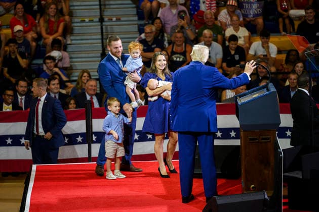 July 24, 2026, Marietta, Ga, United States: U.S. President Donald Trump, greets the Cole and Alyson Loden family before delivering remarks on Trump Accounts and the economy at Wheeler High School, July 22, 2026, in Marietta, Georgia. Marietta United States - ZUMAp138 20260724_zaa_p138_014 Copyright: xMollyxRiley WhitexHousex