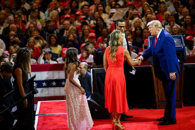 July 24, 2026, Marietta, Ga, United States: U.S. President Donald Trump, greets families on-stage before delivering remarks on Trump Accounts and the economy at Wheeler High School, July 22, 2026, in Marietta, Georgia. Marietta United States - ZUMAp138 20260724_zaa_p138_029 Copyright: xMollyxRiley WhitexHousex