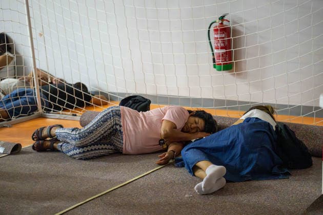 July 24, 2026, Madrid, Madrid, Spain: Nearly 1,000 people evacuated due to a wave of wildfires in the southwest of the Madrid region spend the night sheltered at the Villamanta municipal sports center, hastily converted into an emergency reception facility. Madrid Spain - ZUMAd308 20260724_zsp_d308_008 Copyright: xJuanxCarlosxLucasx