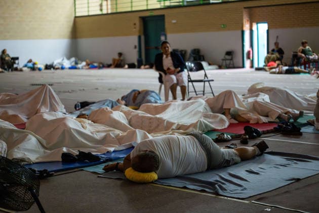 July 24, 2026, Madrid, Madrid, Spain: Nearly 1,000 people evacuated due to a wave of wildfires in the southwest of the Madrid region spend the night sheltered at the Villamanta municipal sports center, hastily converted into an emergency reception facility. Madrid Spain - ZUMAd308 20260724_zsp_d308_020 Copyright: xJuanxCarlosxLucasx