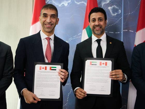 July 24, 2026, Toronto, On, Canada: United Arab Emirates Minister of Foreign Trade Dr. Thani bin Ahmed Al Zeyoudi, left, and Canada s Minister of International Trade Maninder Sidhu sign a joint agreement at a press conference in Toronto, on Friday, July 24, 2026. Toronto Canada  - ZUMAc35_ 20260724_zaf_c35_047 Copyright: xSammyxKoganx