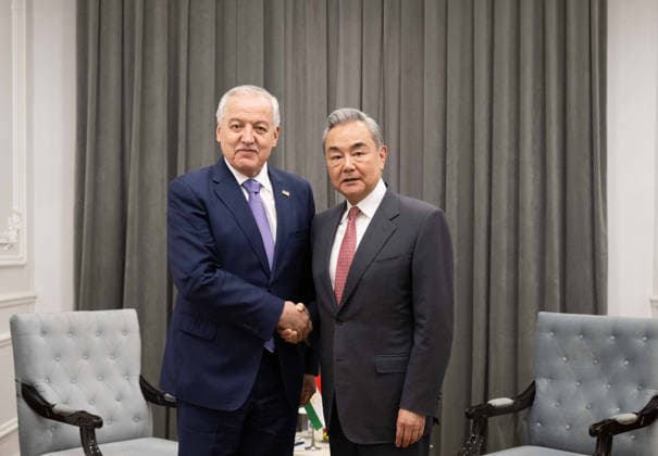 (260724) -- CHOLPON-ATA, July 24, 2026 -- Chinese Foreign Minister Wang Yi, also a member of the Political Bureau of the Communist Party of China Central Committee, meets with Tajik Foreign Minister Sirojiddin Muhriddin on the sidelines of the Meeting of the Council of the Ministers of Foreign Affairs of the Shanghai Cooperation Organization (SCO) Member States in Kyrgyzstan, July 24, 2026. ) KYRGYZSTAN-CHOLPON-ATA-CHINESE FM-TAJIK FM-MEETING LixRenzi 
