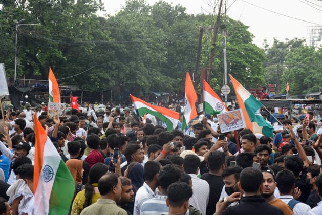 Kolkata Students Protest Pradhan Demonstrators carry Indian flags and placards through a dense rally crowd in Kolkata, India, on July 24, 2026. The rally, titled All Cockroaches of Bengal, marched from Sealdah to Dharmatala to protest against Union Education Minister Dharmendra Pradhan and alleged police violence in Delhi, with students from several organizations taking part. Kolkata West Bengal India Copyright: xAmitxGhoshx