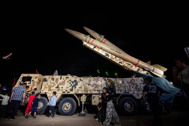 Iranian Zulfiqar road-mobile, ballistic missiles are displayed during a pro-government demonstration in Tehran, Iran, on Friday, July 24, 2026. U.S. and Iran traded attacks for the 13th night in a row with few signs of either side returning to negociations.  IRN2026072405 BehnamxTofighi