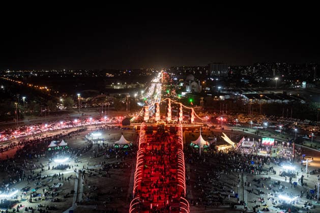 People gather for a pro-government demonstration in Tehran, Iran, on Friday, July 24, 2026. U.S. and Iran traded attacks for the 13th night in a row with few signs of either side returning to negociations.  IRN2026072410 BehnamxTofighi