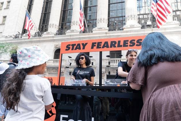 July 24, 2026, New York, New York, USA: State Street (index STT) rings closing bell to celebrate Fearless Girl of the New York Stock Exchange (NYSE) in New York, NY on July 24, 2026. The Fearless Girl is a famous four-foot bronze statue created by artist Kristen Visbal and commissioned by State Street Global Advisors (a division of State Street Corporation). To mark the occasion State Street throw the block party in front of NYSE. New York USA  - ZUMAr339 20260724_znp_r339_002 Copyright: xLevxRadinx