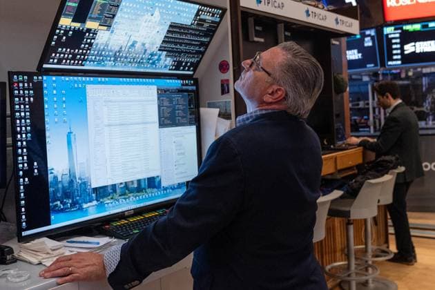 July 24, 2026, New York, New York, USA: A trader works on the floor of the New York Stock Exchange (NYSE) in New York, NY on July 24, 2026. New York USA - ZUMAr339 20260724_znp_r339_007 Copyright: xLevxRadinx