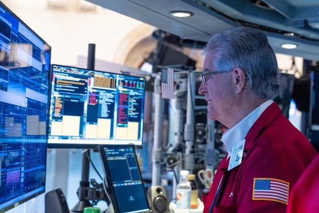 July 24, 2026, New York, New York, USA: A trader works on the floor of the New York Stock Exchange (NYSE) in New York, NY on July 24, 2026. New York USA  - ZUMAr339 20260724_znp_r339_018 Copyright: xLevxRadinx