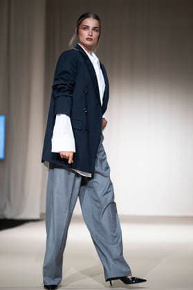 ROMANIAN DESIGNERS - MOMAD Fashion Week de Madrid ,Spain - 24 Jul 2026 A model walks the runway wearing a design by Romanian designers during Momad Fashion Week de Madrid in IFEMA Madrid Spain Copyright: xAtilanoxGarciax xSOPAxImagesx photo03111