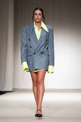 ROMANIAN DESIGNERS - MOMAD Fashion Week de Madrid ,Spain - 24 Jul 2026 A model walks the runway wearing a design by Romanian designers during Momad Fashion Week de Madrid in IFEMA Madrid Spain Copyright: xAtilanoxGarciax xSOPAxImagesx photo03112