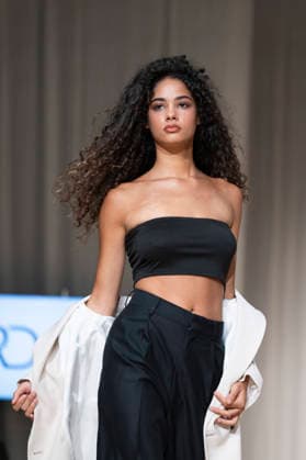 ROMANIAN DESIGNERS - MOMAD Fashion Week de Madrid ,Spain - 24 Jul 2026 A model walks the runway wearing a design by Romanian designers during Momad Fashion Week de Madrid in IFEMA Madrid Spain Copyright: xAtilanoxGarciax xSOPAxImagesx photo03119