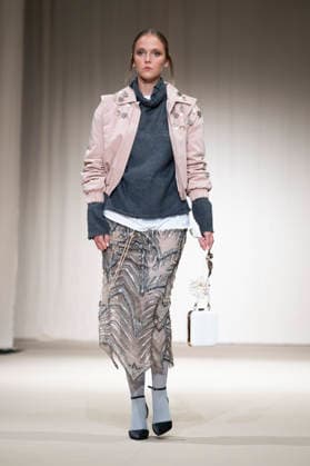 ROMANIAN DESIGNERS - MOMAD Fashion Week de Madrid ,Spain - 24 Jul 2026 A model walks the runway wearing a design by Romanian designers during Momad Fashion Week de Madrid in IFEMA Madrid Spain Copyright: xAtilanoxGarciax xSOPAxImagesx photo03131