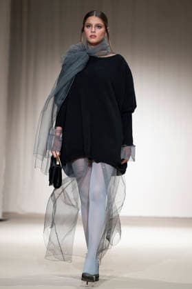 ROMANIAN DESIGNERS - MOMAD Fashion Week de Madrid ,Spain - 24 Jul 2026 A model walks the runway wearing a design by Romanian designers during Momad Fashion Week de Madrid in IFEMA Madrid Spain Copyright: xAtilanoxGarciax xSOPAxImagesx photo03133
