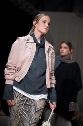 ROMANIAN DESIGNERS - MOMAD Fashion Week de Madrid ,Spain - 24 Jul 2026 A model walks the runway wearing a design by Romanian designers during Momad Fashion Week de Madrid in IFEMA Madrid Spain Copyright: xAtilanoxGarciax xSOPAxImagesx photo03136
