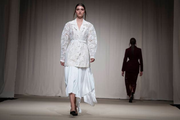 ROMANIAN DESIGNERS - MOMAD Fashion Week de Madrid ,Spain - 24 Jul 2026 A model walks the runway wearing a design by Romanian designers during Momad Fashion Week de Madrid in IFEMA Madrid Spain Copyright: xAtilanoxGarciax xSOPAxImagesx photo03143