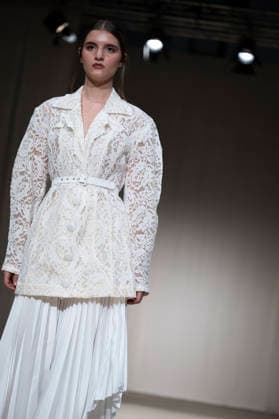 ROMANIAN DESIGNERS - MOMAD Fashion Week de Madrid ,Spain - 24 Jul 2026 A model walks the runway wearing a design by Romanian designers during Momad Fashion Week de Madrid in IFEMA Madrid Spain Copyright: xAtilanoxGarciax xSOPAxImagesx photo03144