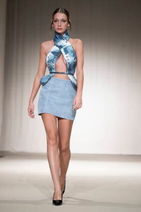 ROMANIAN DESIGNERS - MOMAD Fashion Week de Madrid ,Spain - 24 Jul 2026 A model walks the runway wearing a design by Romanian designers during Momad Fashion Week de Madrid in IFEMA Madrid Spain Copyright: xAtilanoxGarciax xSOPAxImagesx photo03161