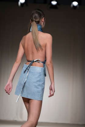 ROMANIAN DESIGNERS - MOMAD Fashion Week de Madrid ,Spain - 24 Jul 2026 A model walks the runway wearing a design by Romanian designers during Momad Fashion Week de Madrid in IFEMA Madrid Spain Copyright: xAtilanoxGarciax xSOPAxImagesx photo03163