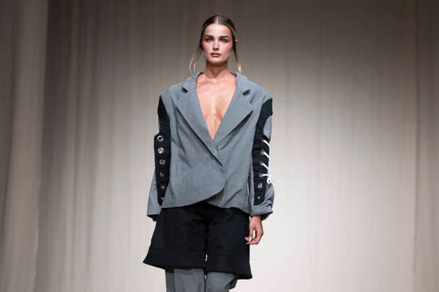 ROMANIAN DESIGNERS - MOMAD Fashion Week de Madrid ,Spain - 24 Jul 2026 A model walks the runway wearing a design by Romanian designers during Momad Fashion Week de Madrid in IFEMA Madrid Spain Copyright: xAtilanoxGarciax xSOPAxImagesx photo03176