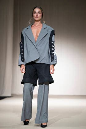 ROMANIAN DESIGNERS - MOMAD Fashion Week de Madrid ,Spain - 24 Jul 2026 A model walks the runway wearing a design by Romanian designers during Momad Fashion Week de Madrid in IFEMA Madrid Spain Copyright: xAtilanoxGarciax xSOPAxImagesx photo03177