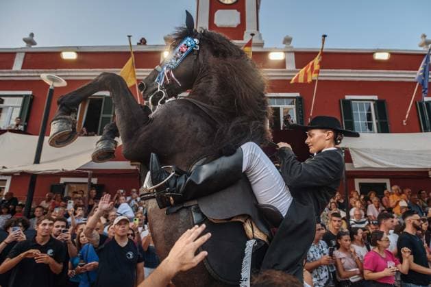 July 24, 2026, Es Castell, Menorca Balearic Islands, Spain: A caixer, or horse rider, rears his horse amid a cheering crowd during the traditional Jaleo at the Sant MartoÂ­ Festival in Es Castell. Es Castell Spain  - ZUMAo105 20260724_fap_o105_010 Copyright: xMatthiasxOesterlex