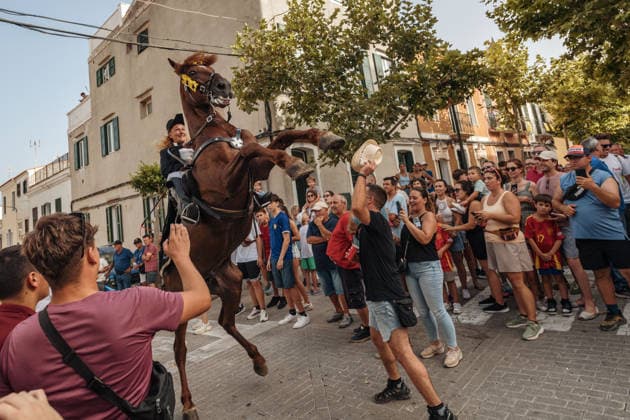 July 24, 2026, Es Castell, Menorca Balearic Islands, Spain: A caixer, or horse rider, rears his horse prior to the traditional Jaleo at the Sant MartoÂ­ Festival in Es Castell. Es Castell Spain  - ZUMAo105 20260724_fap_o105_020 Copyright: xMatthiasxOesterlex