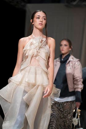 July 24, 2026, Madrid, Spain: A model walks the runway wearing a design by Romanian designers during Momad Fashion Week de Madrid in IFEMA Madrid Spain - ZUMAs197 20260724_aaa_s197_175 Copyright: xAtilanoxGarciax