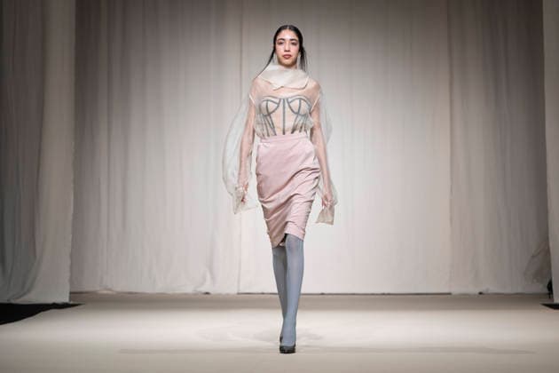 July 24, 2026, Madrid, Spain: A model walks the runway wearing a design by Romanian designers during Momad Fashion Week de Madrid in IFEMA Madrid Spain  - ZUMAs197 20260724_aaa_s197_184 Copyright: xAtilanoxGarciax