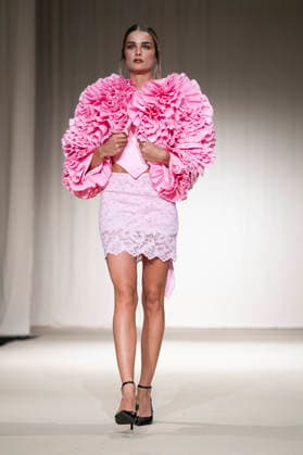 July 24, 2026, Madrid, Spain: A model walks the runway wearing a design by Romanian designers during Momad Fashion Week de Madrid in IFEMA Madrid Spain  - ZUMAs197 20260724_aaa_s197_209 Copyright: xAtilanoxGarciax