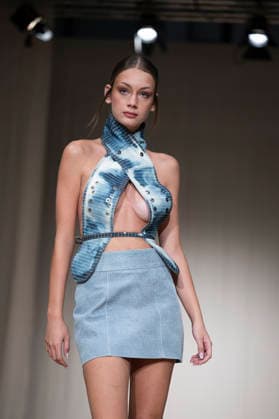 July 24, 2026, Madrid, Spain: A model walks the runway wearing a design by Romanian designers during Momad Fashion Week de Madrid in IFEMA Madrid Spain  - ZUMAs197 20260724_aaa_s197_230 Copyright: xAtilanoxGarciax