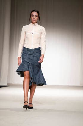 July 24, 2026, Madrid, Spain: A model walks the runway wearing a design by Romanian designers during Momad Fashion Week de Madrid in IFEMA Madrid Spain - ZUMAs197 20260724_aaa_s197_200 Copyright: xAtilanoxGarciax