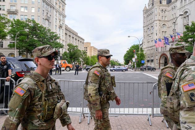 July 24, 2026, Washington, District Of Columbia, United States: National Guard personnel patrol near the Waldorf Astoria Hotel as U.S. President DONALD TRUMP attends the White House Correspondents Dinner. Washington United States - ZUMAk206 20260724_znp_k206_010 Copyright: xMattxKaminskyx